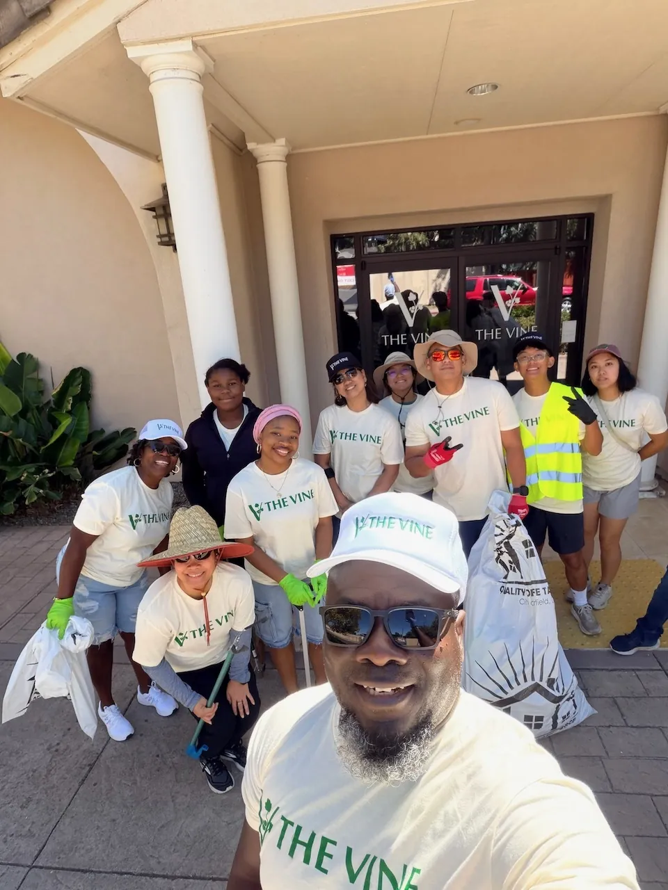 A cleanup team from The Vine with grabbers and a City of Fairfield trash bag, ready to head out