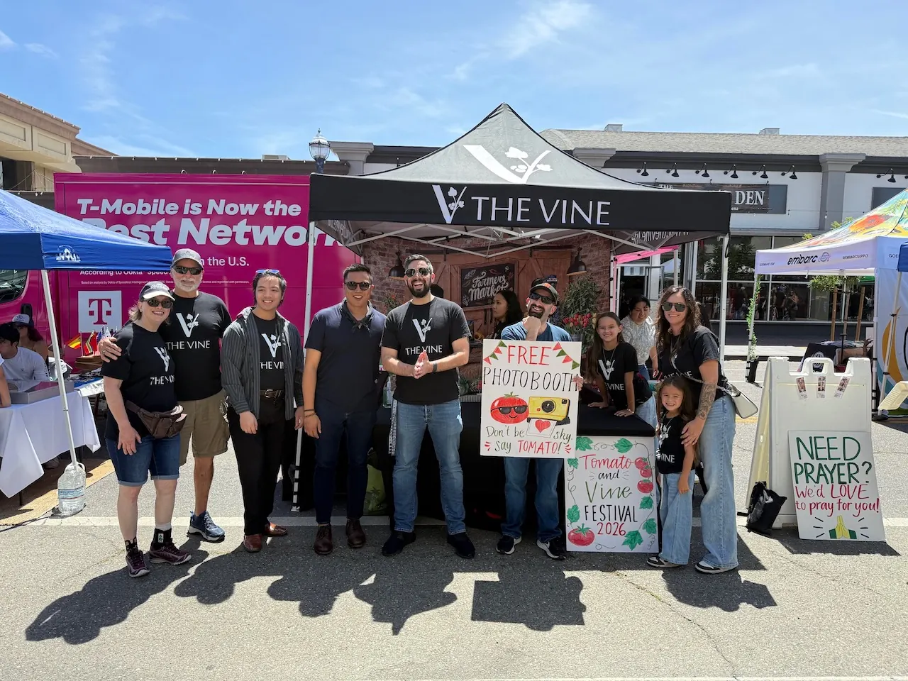 The Vine's booth at the Fairfield Tomato & Vine Festival, offering a free photo booth and prayer to anyone walking by